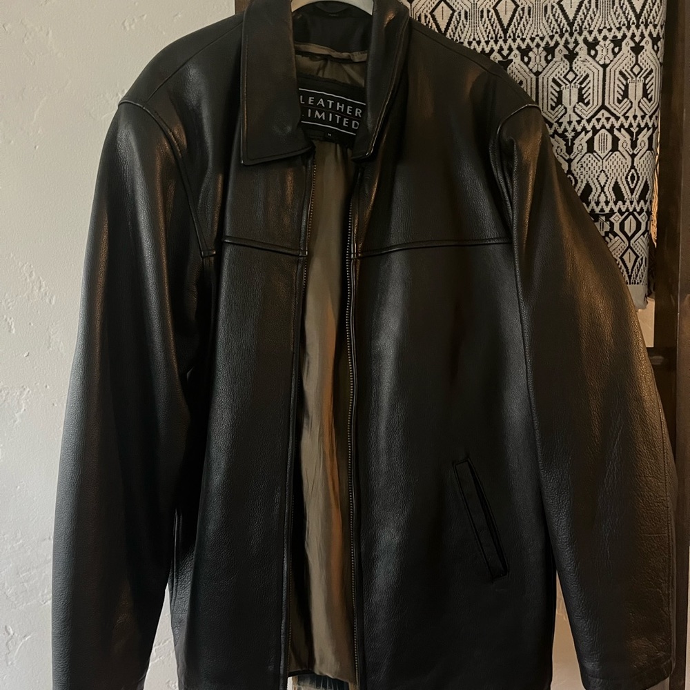 Heavy large zip up leather jacket